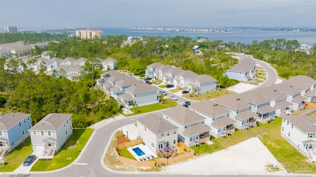 bird's eye view with a water view