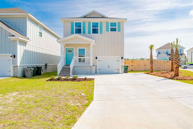 view of front of house with a garage and a front yard