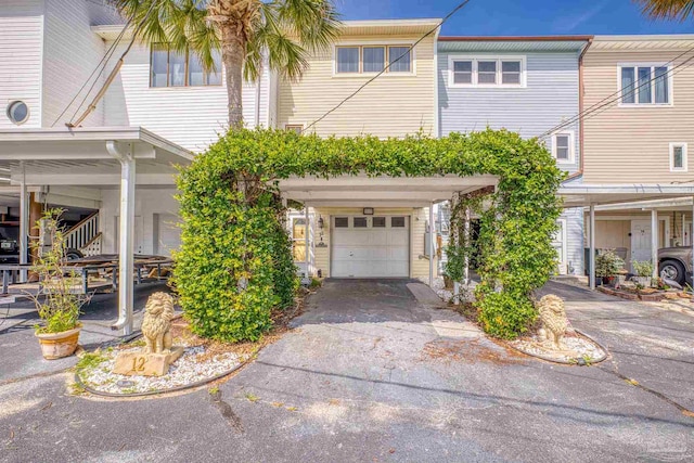 view of front of property with a garage