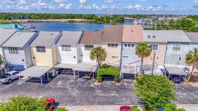 drone / aerial view with a water view