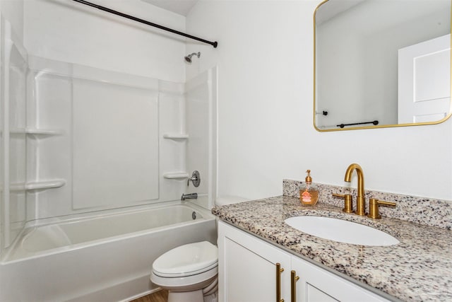 full bathroom featuring  shower combination, toilet, and vanity