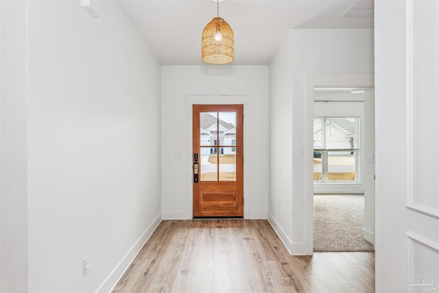 doorway to outside featuring light hardwood / wood-style floors