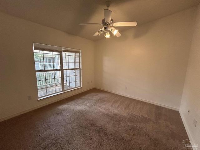 7101 Joy St Unit K7, Pensacola, FL 32504 - unfurnished room with carpet floors, baseboards, and a ceiling fan