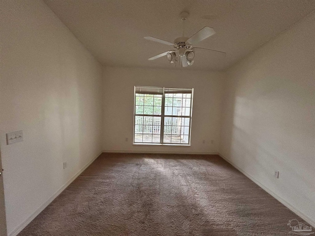 7101 Joy St Unit K7, Pensacola, FL 32504 - unfurnished room with carpet floors, ceiling fan, and baseboards