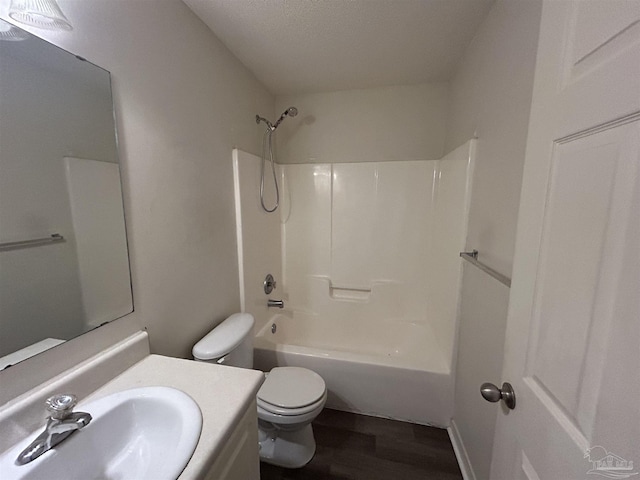 7101 Joy St Unit K7, Pensacola, FL 32504 - bathroom with wood finished floors, vanity, toilet, and shower / bathtub combination