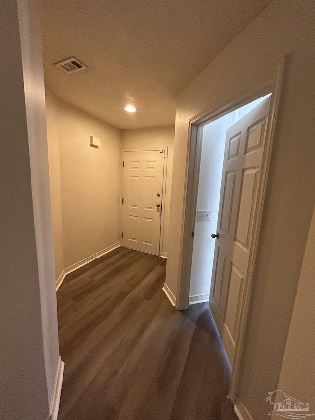 7101 Joy St Unit K7, Pensacola, FL 32504 - hall with baseboards, dark wood finished floors, recessed lighting, and a textured ceiling