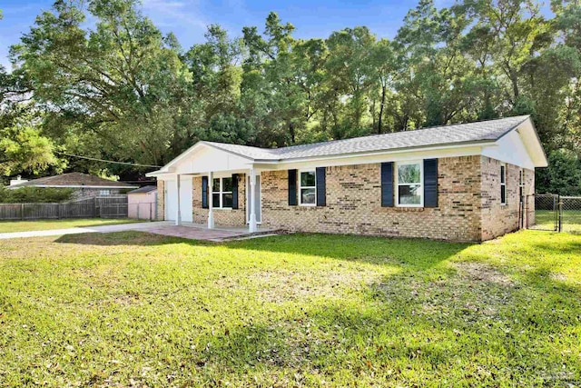 single story home with a gate, a fenced backyard, a front lawn, concrete driveway, and brick siding