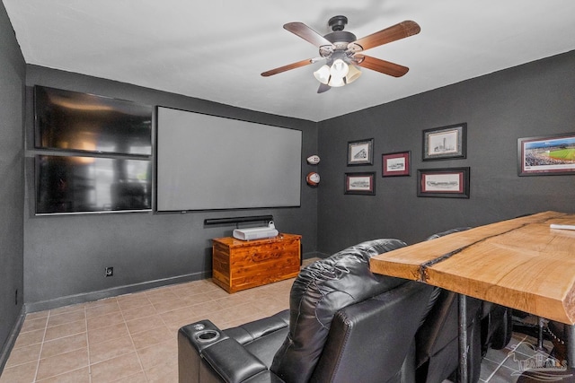 home theater room with ceiling fan