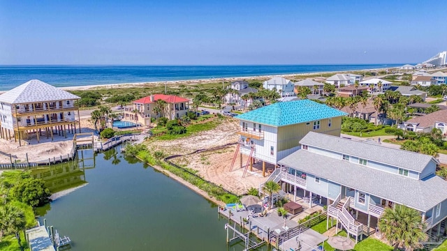 birds eye view of property with a residential view and a water view