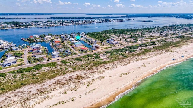 bird's eye view featuring a beach view and a water view