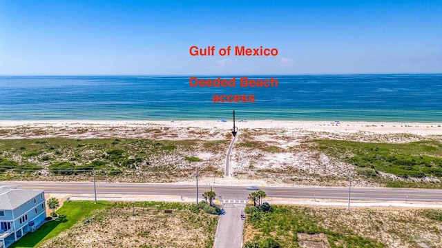 property view of water featuring a beach view