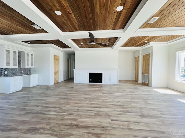 unfurnished living room with visible vents, coffered ceiling, and wooden ceiling