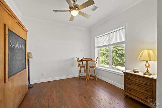 living area featuring dark wood-style flooring, crown molding, visible vents, a ceiling fan, and baseboards