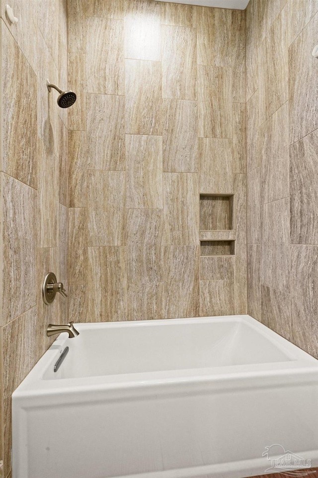 bathroom with shower / bathing tub combination