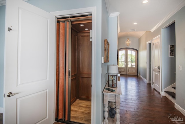 interior space with baseboards, ornamental molding, dark wood-type flooring, french doors, and recessed lighting