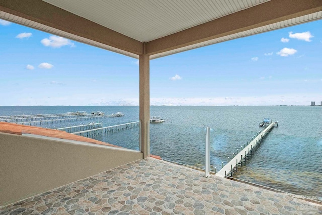 view of patio featuring a water view