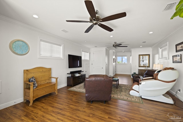 living area featuring baseboards, visible vents, dark wood-style flooring, crown molding, and recessed lighting