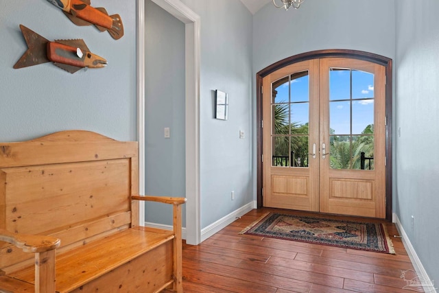 foyer entrance with french doors and wood-type flooring