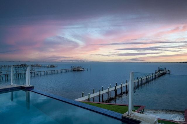 view of dock with a water view