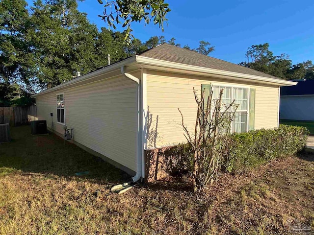 view of property exterior with central AC unit