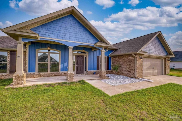 view of front of property with board and batten siding, a garage, a front lawn, and concrete driveway