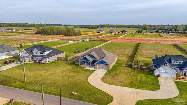 birds eye view of property featuring a rural view