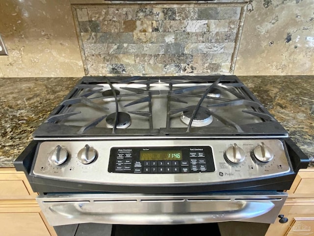 interior details featuring light brown cabinets and stainless steel range