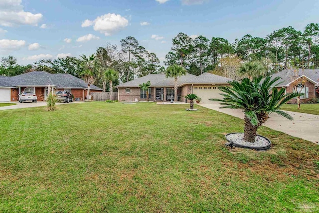 view of front of house with a front lawn and a garage