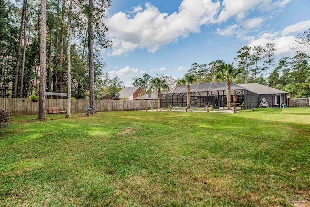 view of yard with a lanai