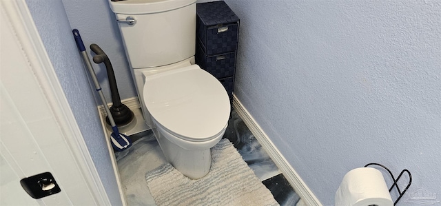 bathroom featuring toilet