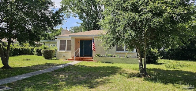 view of front of house with a front yard