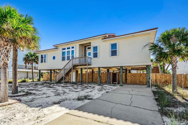 view of front of property with a carport