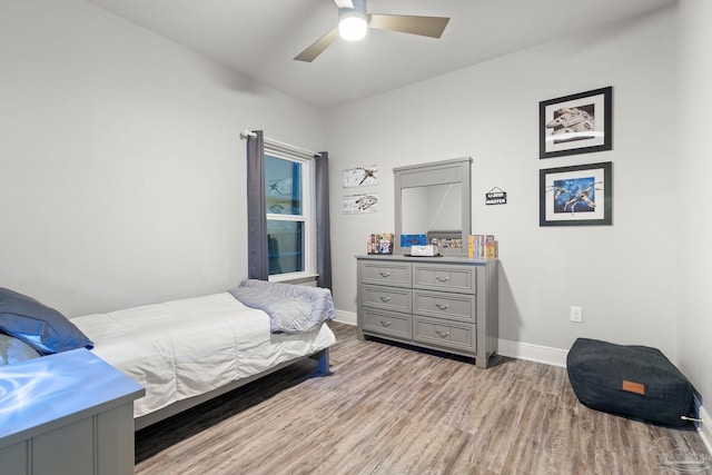 bedroom featuring ceiling fan and light hardwood / wood-style floors