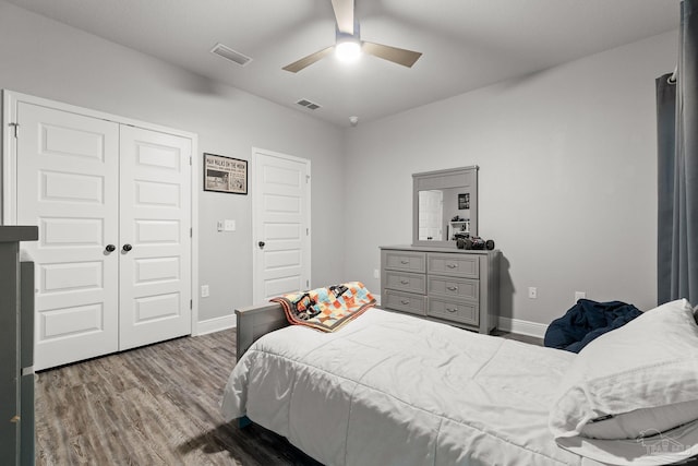 bedroom with a closet, ceiling fan, and wood-type flooring