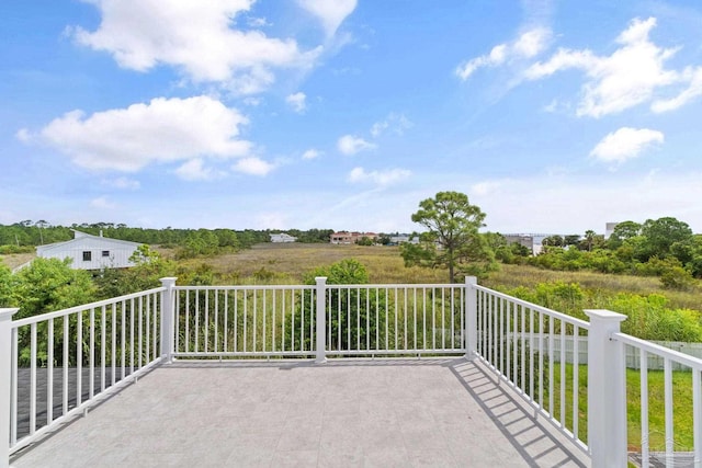 view of patio with a balcony