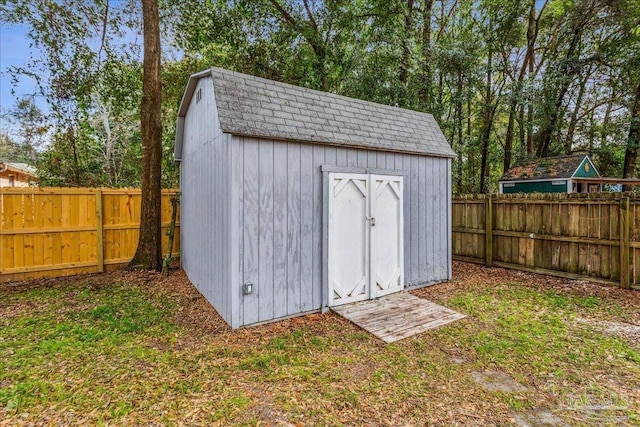 view of outdoor structure with a yard