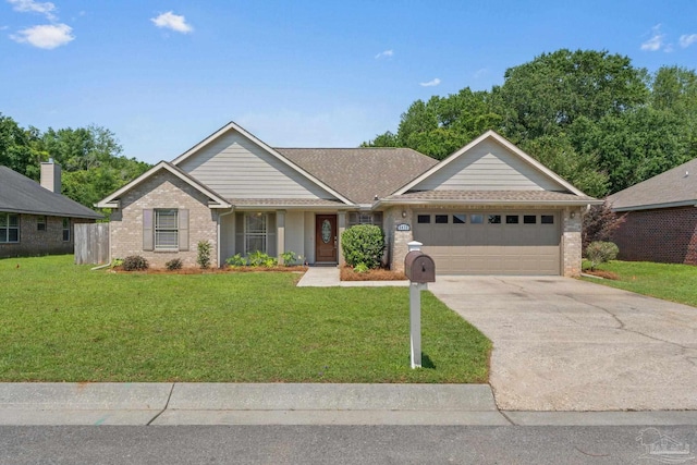 5473 Tucker Cir, Pace, FL 32571 - ranch-style house with an attached garage, brick siding, a front yard, and driveway