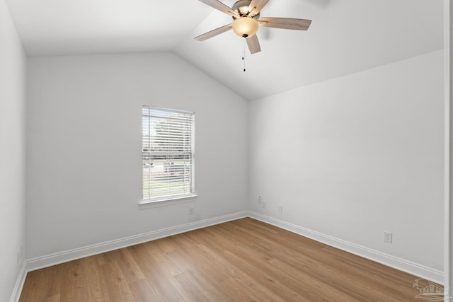 5473 Tucker Cir, Pace, FL 32571 - empty room featuring a ceiling fan, light wood-type flooring, baseboards, and lofted ceiling
