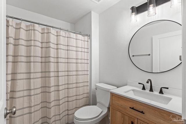 5473 Tucker Cir, Pace, FL 32571 - full bath featuring toilet, vanity, and curtained shower