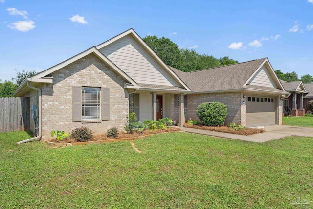 5473 Tucker Cir, Pace, FL 32571 - ranch-style house featuring an attached garage, brick siding, and concrete driveway
