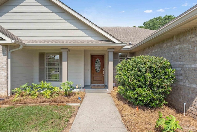 5473 Tucker Cir, Pace, FL 32571 - entrance to property featuring brick siding and a shingled roof