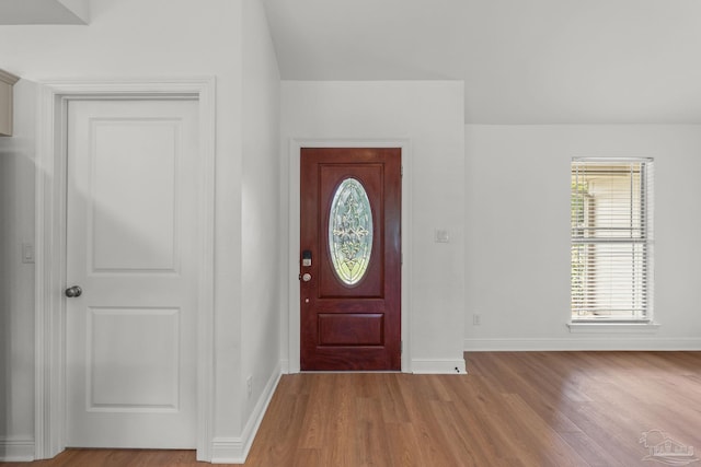 5473 Tucker Cir, Pace, FL 32571 - foyer entrance featuring baseboards and wood finished floors