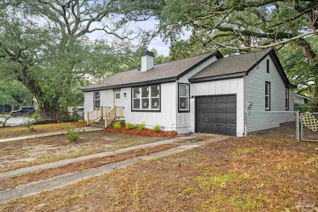 single story home with a garage