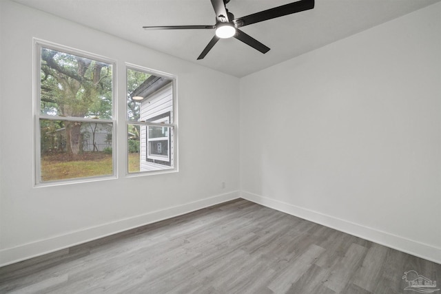 unfurnished room featuring wood-type flooring and ceiling fan