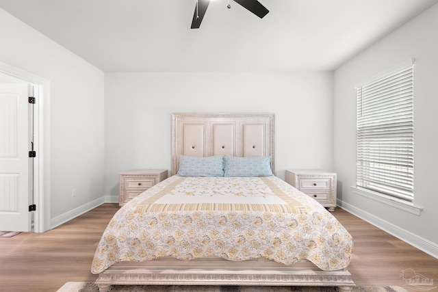 3041 Mountain Laurel Trl, Cantonment, FL 32533 - bedroom with a ceiling fan, baseboards, and wood finished floors