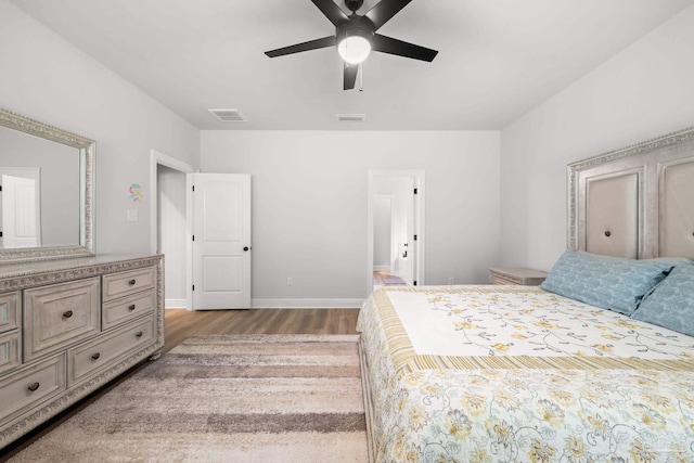 3041 Mountain Laurel Trl, Cantonment, FL 32533 - bedroom featuring ceiling fan, baseboards, visible vents, and wood finished floors