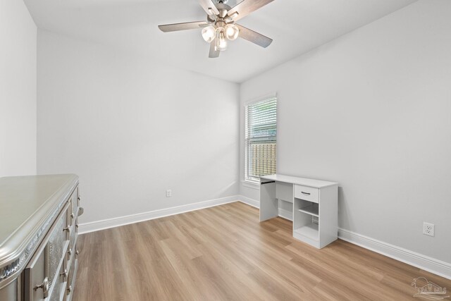 3041 Mountain Laurel Trl, Cantonment, FL 32533 - unfurnished bedroom featuring baseboards, light wood-style floors, and ceiling fan