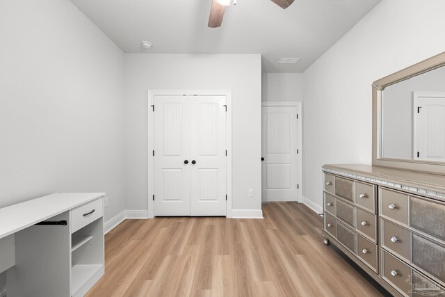 3041 Mountain Laurel Trl, Cantonment, FL 32533 - unfurnished bedroom with baseboards, a closet, light wood-style flooring, and visible vents