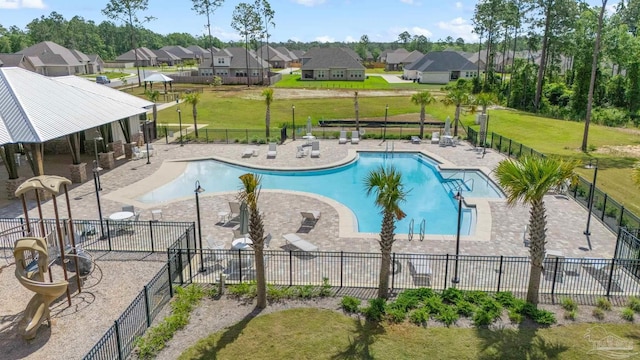 3041 Mountain Laurel Trl, Cantonment, FL 32533 - pool with a patio area, fence, a yard, and a residential view
