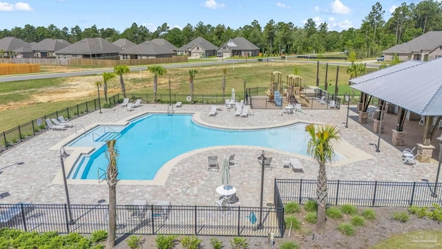 3041 Mountain Laurel Trl, Cantonment, FL 32533 - pool featuring a lawn, a patio area, and fence